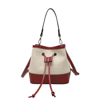 China Large Capacity Best Quality Canvas Cotton PU Leather Bucket Bags Large Capacity Shoulder Bag Drawstring Shopping Bag Women Handbags for sale