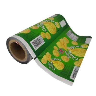 China Cheap Even Moisture Proof Custom Printed Aluminum Foil Plastic Blown Food Plastic Bag Popcorn Packaging Bag Roll Films With Laminated Material for sale