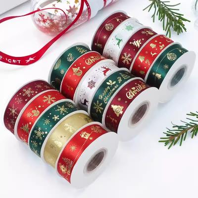 China Terylene 2.5cm Gold Polyester Ribbon for Christmas Packaging and Tree Decorations-Hot DIY Christmas Ribbon Packaging Gift Ideas for sale