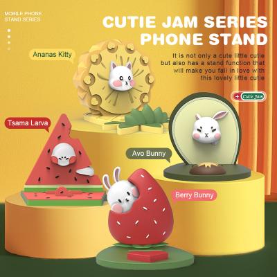 China Cute Cartoon Adjustable Fruit Lazy Phone Holders For Iphone Samsung Liquid Silicone Holders Multi Fish Non Slip Desktop Bracket for sale