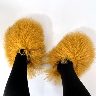 China 2022 New Design Wholesale Disposable Luxury Yellow Sheep Fur Real Slippers Slippers For Women for sale