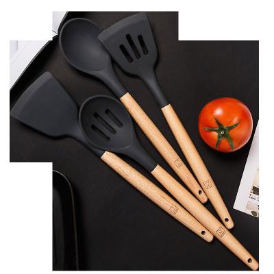 China Hotsale Silicone Cookware Silicone Spoon Set With Wooden Handle for sale