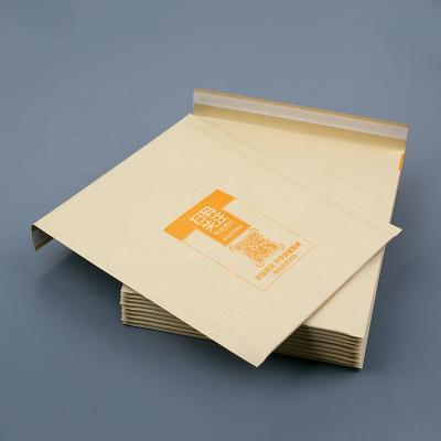 China Shock Resistance Customize Brown Padded Kraft Paper Bubble Envelopes With Orange Color Logo Printed Shock Resistance Kraft Bubble Mailer for sale