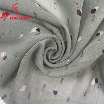 China Tear-resistant 100% Polyester Chiffon Fabric With Lurex Pleated Print Crinkle Woven Gold And Silver Metallic Yarn Cut Pattern Fabric for sale