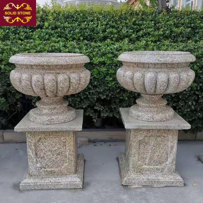 China Modern Wholesale Hand Carved Natural Stone Outdoor Garden Urn Planter For Sale for sale