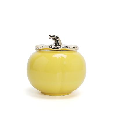 China Hot Selling Pumpkin Color Storage Round Ceramic Decorative Food Sealed Storage Jar for sale