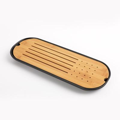 China Wholesale Ceramic Bamboo Combination Tray Original Supply Porcelain Boat Shaped Tray Eco-friendly Black Dish Tea Set for sale