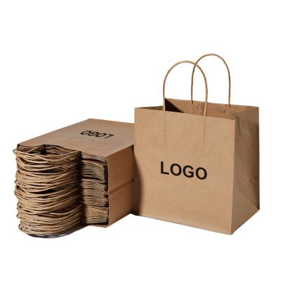 China Custom Colorful Brown Kraft Paper Craft Eco Friendly Premium Handle Recycled Gift Wrapping Shopping Paper Bags With Your Logo for sale