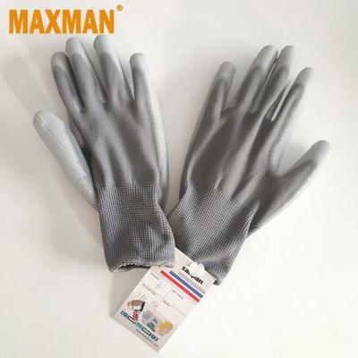 China Cut Cut Resistant PE Knitted Glove With Gray Nitrile Rough On Palm for sale