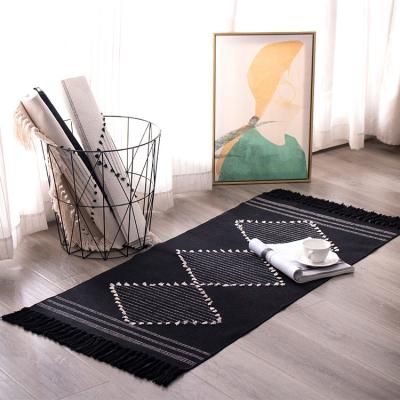 China Hand-knotted Washable Tassels Mat Black Floor and White Color Matching Mats Living Room Coffee Bedside Table Carpet for sale