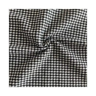 China Stretch fashion checks design 240gsm 81%polyester 17%rayon 2%spandex jacquard knitted fabric for garment for sale