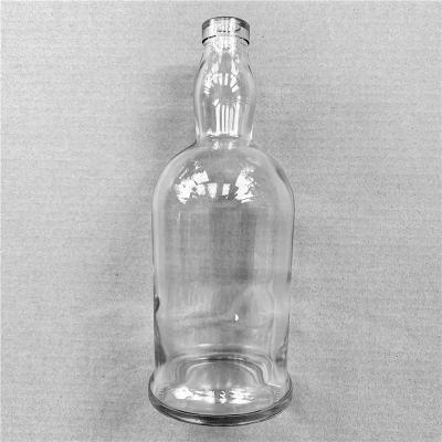 China 750ml liquor liquor bottle, clear glass bottle with synthetic cork on top of the t for sale