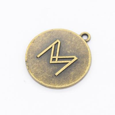 China Customized Zinc Alloy Round Shaped Copper Clothes Metal Pendant Logo Engraved Charms for sale