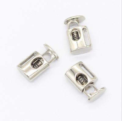 China Clothing nickel-free single belt buckle spring metal hole adjustment buckle alloy bell elastic stopper for sale