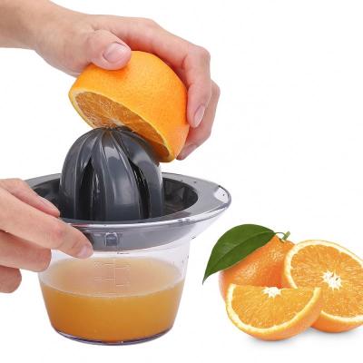 China Viable Plastic Citrus Lemon Fruit Squeezer Manual Orange Citrus Juicer With Strainer And Container for sale