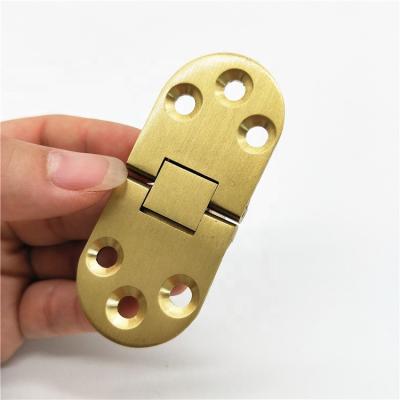 China 180 Degree Table Flap Hinge Folding Zinc Alloy Golden Hidden Hinge for sale