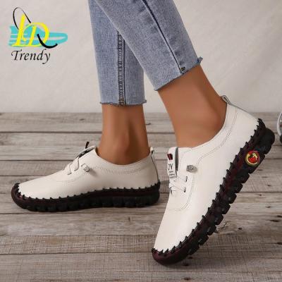 China Outdoor lace-up non-slip loafers comfortable retro flat women's casual shoes single women's shoes soft-soled round sneakers for sale