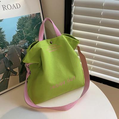 China Fashion 2023 New Canvas Women Fashion Handbags Contrasting Letter Wholesale Women Handbags Large Capacity Designer Shoulder Bags for sale