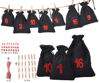 China COTTON Advent Calendar Black Cotton Bag Countdown Christmas Set Christmas Gift Candy Cotton With Drawstring for sale