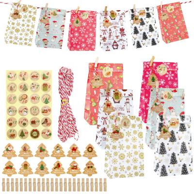 China 2021 New 24 Bags Kraft Paper Wallpapering DIY Christmas Countdown Calendar Bags Candy Gift Bags For Christmas Party for sale