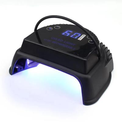 China 2021 New Arrival Cordless Rechargeable 64w Gel Light Nail Lamp Cordless Portable Cordless Black And White UV Led Dryer Machine for sale