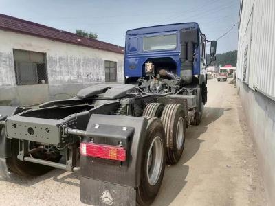 China Sell 6×4 Drive Wheel Sinotruk Tractor Truck with 4-6L Engine Capacity in Blue Color for sale