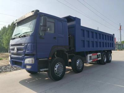 China Gebruikte HOWO Tipper Truck 8X4 Donkerblauw Euro3 voor zware dump in de stedelijke bouw Te koop