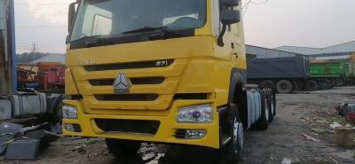 Китай Дизайн беструбной шины Sinotruk 6*4 Тракторный грузовик Желтый Sinotruk головной грузовик продается