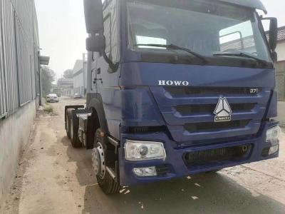 China Manual Gearbox Diesel Blue Sinotruk HOWO 6*4 Tractor Truck for Transportation Solutions for sale