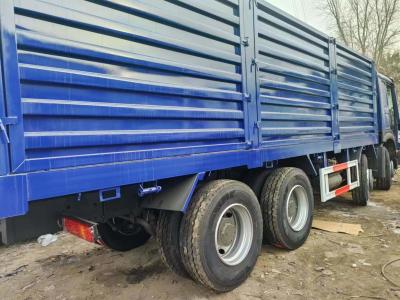 China Sinotruck HOWO Blauw 8*4 Box Truck 10 banden Tweedehands Truck met 6×4 aandrijflijn Te koop