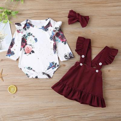 China Kid Breathable Newborn Baby Outfit Toddler Autumn Floral 3pcs Romper Tops Suspender Dress Headband Outfit 0-24M for sale