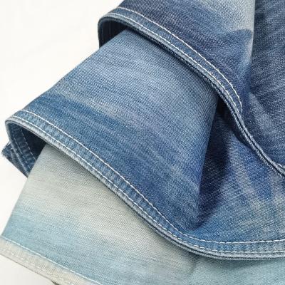 China Breathable Hot Sale 10oz 146cm Width Slubby Jeans Fabric Competitive Stretch Excellent Denim Fabric for sale