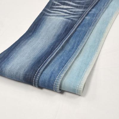 China Breathable 10oz 90% cotton roving denim fabric dark blue desizing jeans weft fabric for sale