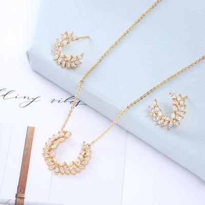 China Trendy Horizon New Arrival Zirconia Jewelry Set Bridal Wedding Wing Shape 18K Gold Jewelry Set Necklace And Earrings 2 Pcs Jewelry Sets for sale