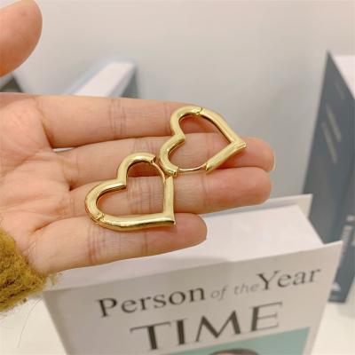 China FASHIONABLE Hot Selling Simple Hollow Love Heart Earrings 18K Gold Plated Oval Earrings For Women for sale