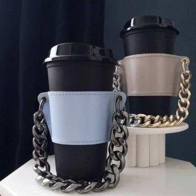 China Viable Creative Leather Tea Cup Sleeve With Handle Bubble Tea Cup Holder Coffee Mug Sleeve With Chain Handle for sale