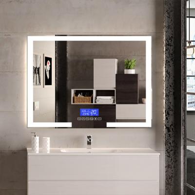 China Hotel Anti Fog Magnifying Luxury Smart Touch Screen Led Wall Bathroom Mirror With Blue Tooth Speaker Time And Temperature Display for sale