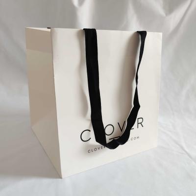 China Qingdao Disposable Machinery Made Custom Print Logo Paper Bag For Restaurant for sale