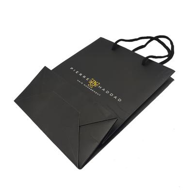 China Qingdao Recyclable Customized Logo Fast Food Takeaway Gift Kraft Paper Bag With Logo Handles for sale