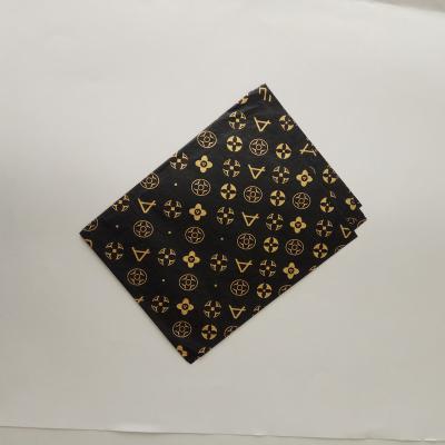 China MOQ Golden Small Logo Printed Black Wrapping Tissue Luxury Moisture Proof Paper for sale