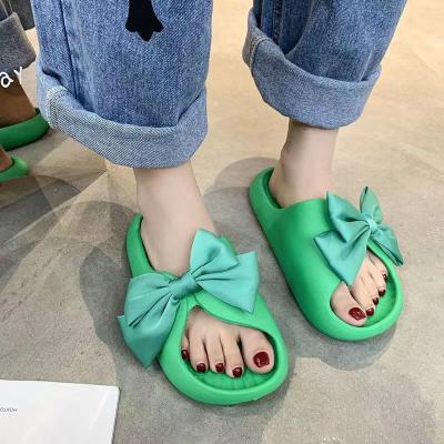 China Cushioning Summer Wear Thick Sole External Sandals Slides Beach Bow Ladies Slippers And Sandal for sale