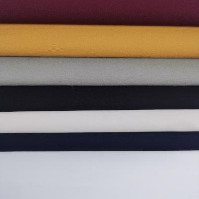 China Anti Pill Hot selling Nylon Rayon Spandex Woven Fabric Bengaline Fabric Millenium Solid fabric for Dresses and Pants for sale