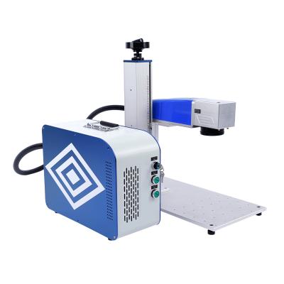 China Laser Metal Ring 50w Fiber Laser Marking Machine Price for sale