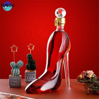 China Eco-friendly Recyclable Hot Sale High-heeled Vodka Brandy Frosted Bottles Wine 750ml Empty Glass Liquor Bottle for sale