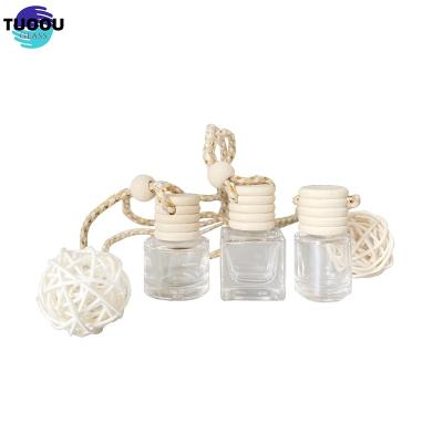 China Cosmetic Cute perfume glass empty interior accessories essential oil car fragrance bottle for sale