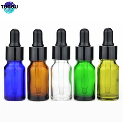 China Essential oil container Wholesale Hot sale Dropper Amber Glass Essential Oil Bottle en venta