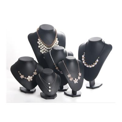 China Leather and Foam According to Customer Requirement Cheap High Quality Luxury Custom Necklace Display Leather Jewelry Mannequin Stand Set for sale