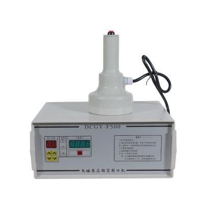 中国 Hand Held Electromagnetic High Efficiency Induction Aluminum Cap Sealing Machine 販売のため