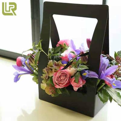 China Recycled Materials Wholesale Price Moisture Resistant Luxury Damp Resistant 5 Colors Flower Gift Boxes With Die Cut Handles for sale