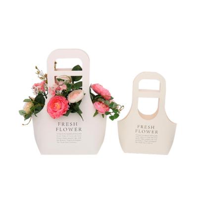 China Biodegradable Fashionable Recycled Kraft Paper Flower Carrier Bag Boxes for sale